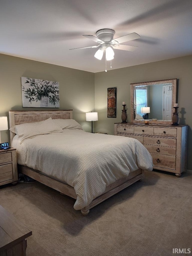 337 W White Pine Ct, Bloomington, IN 47403 - carpeted bedroom featuring a ceiling fan