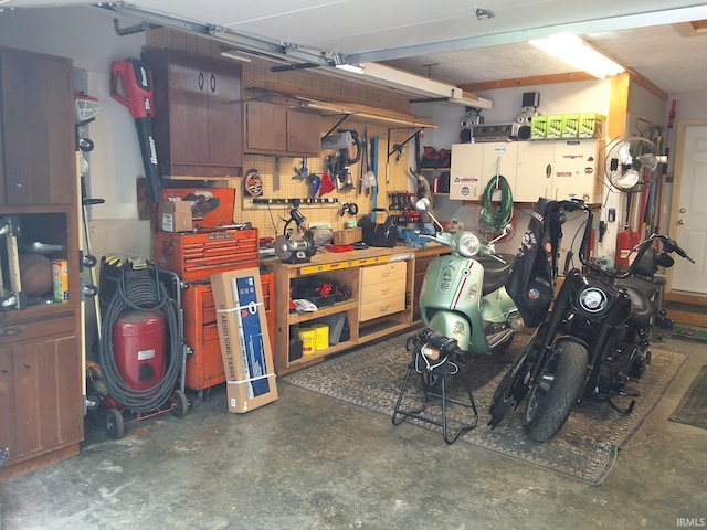 garage featuring a workshop area
