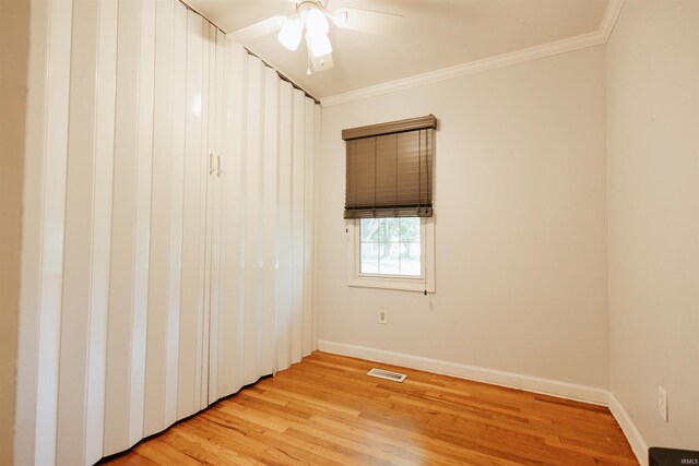 1732 Marbo Ave, Evansville, IN 47714 - spare room featuring light wood-style flooring, ornamental molding, baseboards, and ceiling fan
