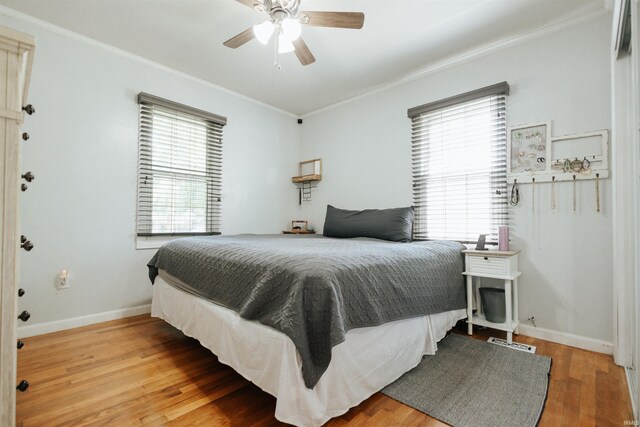 1732 Marbo Ave, Evansville, IN 47714 - bedroom with crown molding, wood finished floors, baseboards, and ceiling fan
