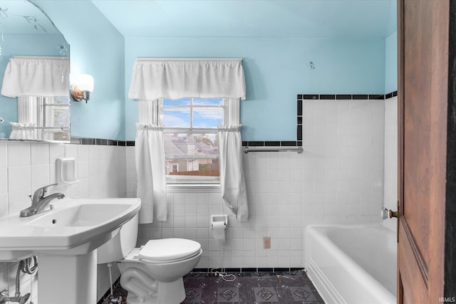 405 W Rudisill Blvd, Fort Wayne, IN 46807 - full bath with toilet, tile walls, a tub to relax in, and a wainscoted wall