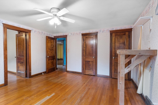 405 W Rudisill Blvd, Fort Wayne, IN 46807 - unfurnished bedroom with light wood finished floors, baseboards, and wallpapered walls
