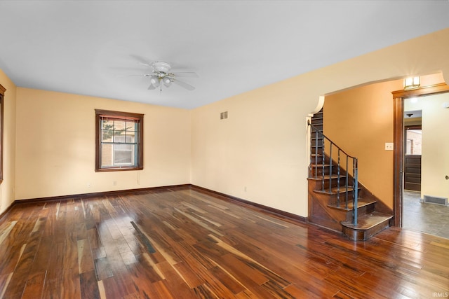 405 W Rudisill Blvd, Fort Wayne, IN 46807 - unfurnished room featuring a ceiling fan, baseboards, visible vents, hardwood / wood-style flooring, and stairway