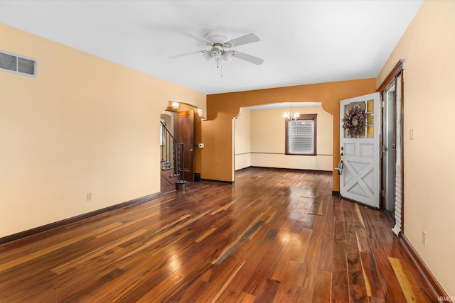 405 W Rudisill Blvd, Fort Wayne, IN 46807 - spare room featuring visible vents, baseboards, ceiling fan with notable chandelier, and hardwood / wood-style flooring