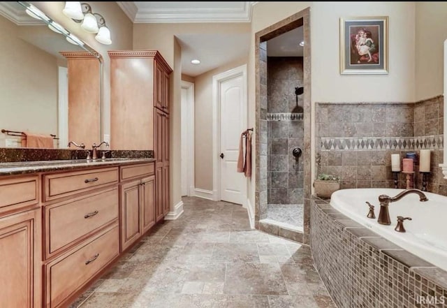 5318 Claiborn Ct, Newburgh, IN 47630 - bathroom featuring vanity, crown molding, stone finish flooring, a garden tub, and tiled shower