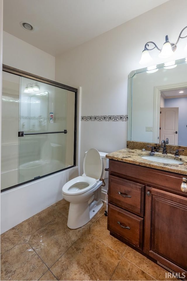 5318 Claiborn Ct, Newburgh, IN 47630 - bathroom featuring toilet, tile patterned flooring, vanity, and combined bath / shower with glass door