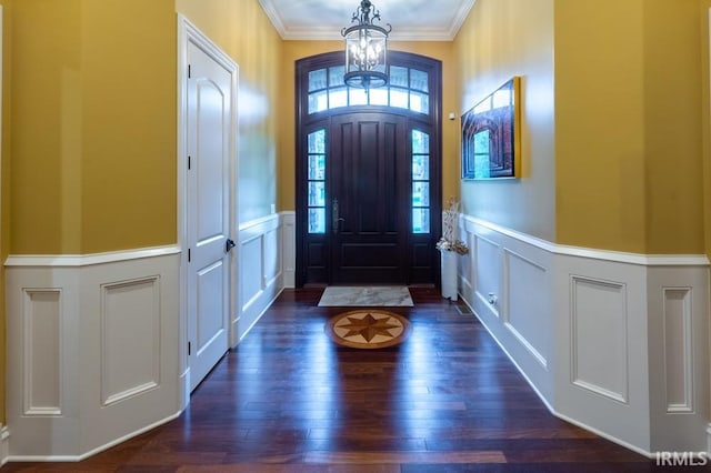 5318 Claiborn Ct, Newburgh, IN 47630 - entryway with ornamental molding, dark wood finished floors, wainscoting, a decorative wall, and a chandelier