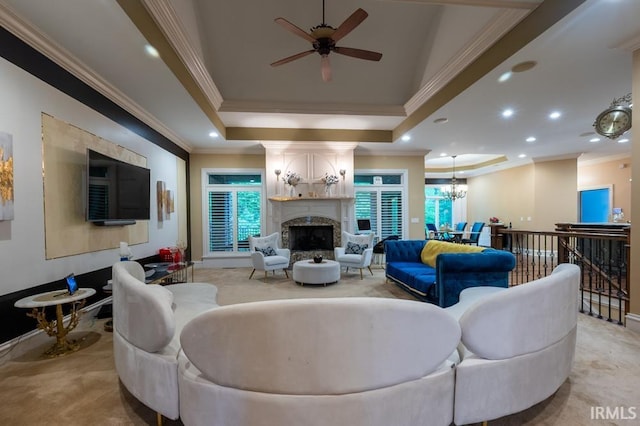 5318 Claiborn Ct, Newburgh, IN 47630 - living room featuring ceiling fan with notable chandelier, a high end fireplace, light colored carpet, recessed lighting, and crown molding