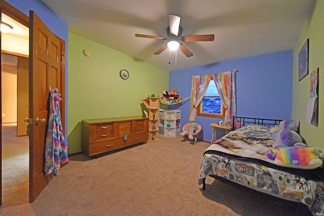 carpeted bedroom with a ceiling fan