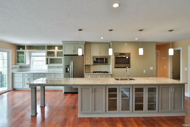 1776 N Royal Oaks Dr, Monticello, IN 47960 - kitchen with stainless steel appliances, a sink, tasteful backsplash, a large island with sink, and recessed lighting