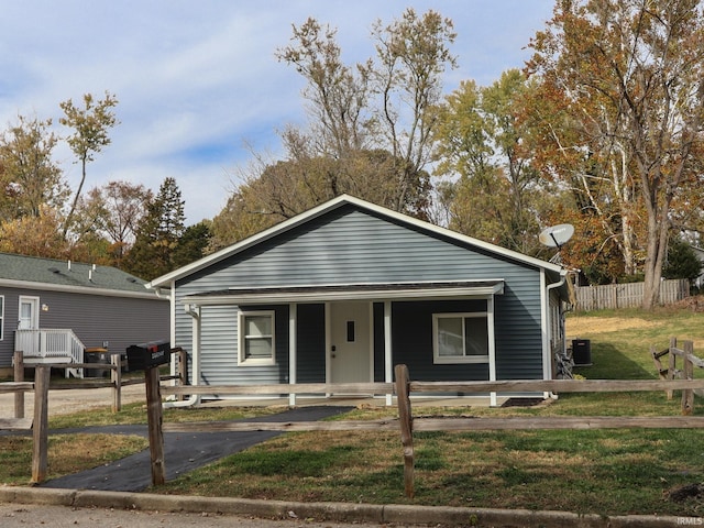 1660 W 8th St, Bloomington, IN 47404 - bungalow-style house featuring central AC unit and covered porch