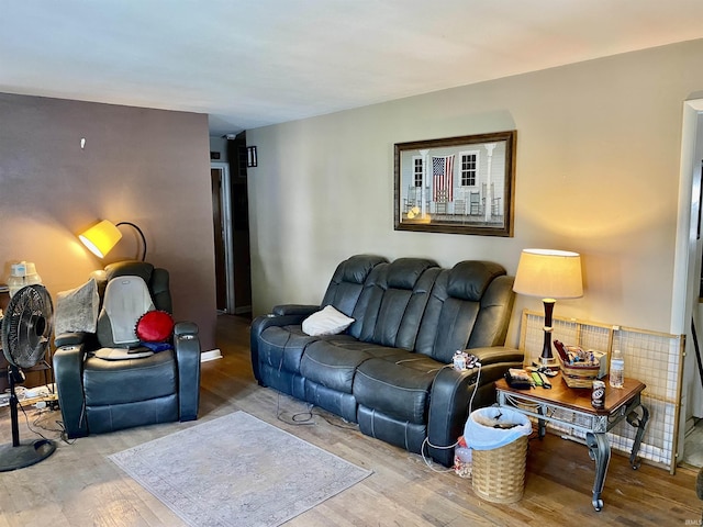 living room with wood finished floors