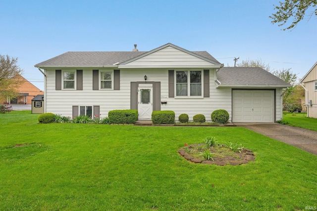 split foyer home featuring asphalt driveway, a front yard, an attached garage, and roof with shingles