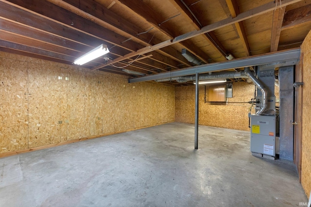 unfinished basement with heating unit