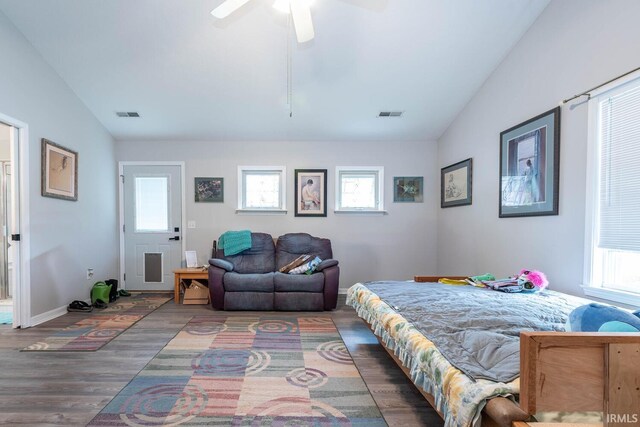 4346 N Centennial Dr, Bloomington, IN 47404 - bedroom featuring lofted ceiling, multiple windows, wood finished floors, ceiling fan, and baseboards