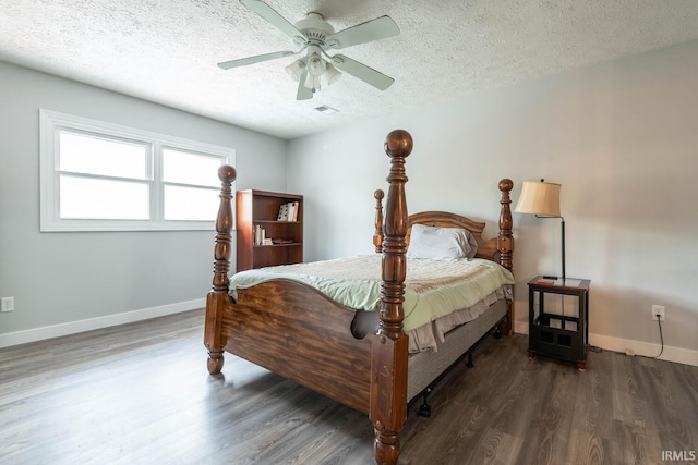 4346 N Centennial Dr, Bloomington, IN 47404 - bedroom featuring a textured ceiling, baseboards, wood finished floors, and a ceiling fan