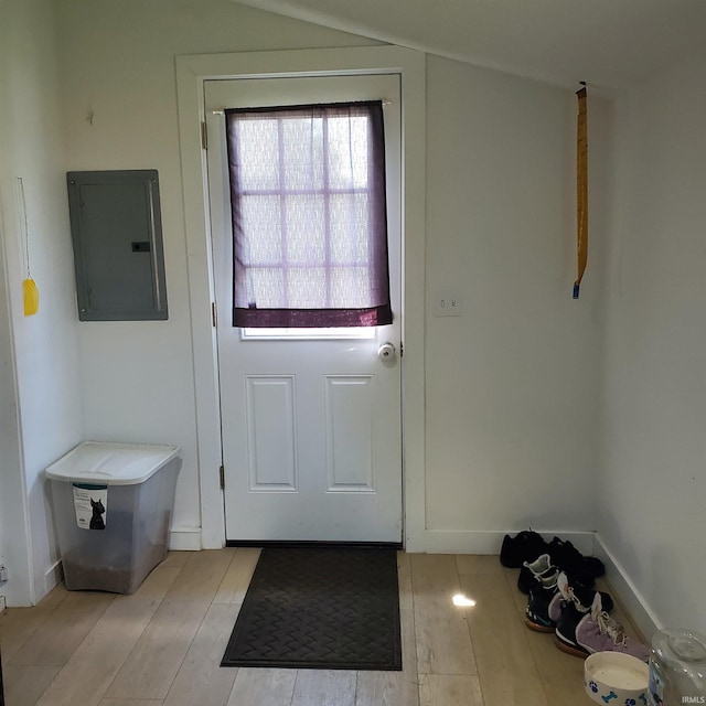 1202 Magnolia Ave, Frankfort, IN 46401 - doorway to outside featuring electric panel and light wood-style floors