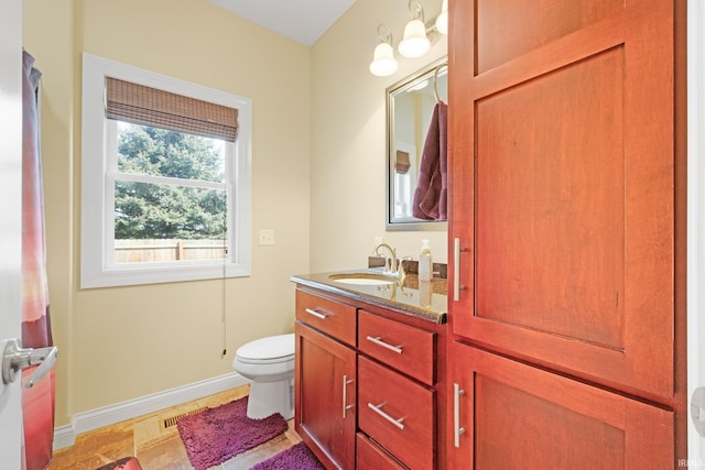 6840 S 300 E, Hamilton, IN 46742 - bathroom with vanity, baseboards, and toilet