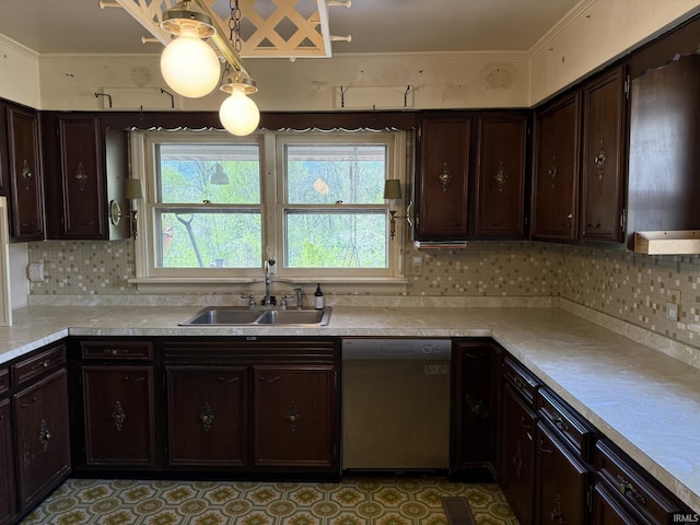 kitchen with dishwasher, a sink, light countertops, dark brown cabinetry, and ornamental molding