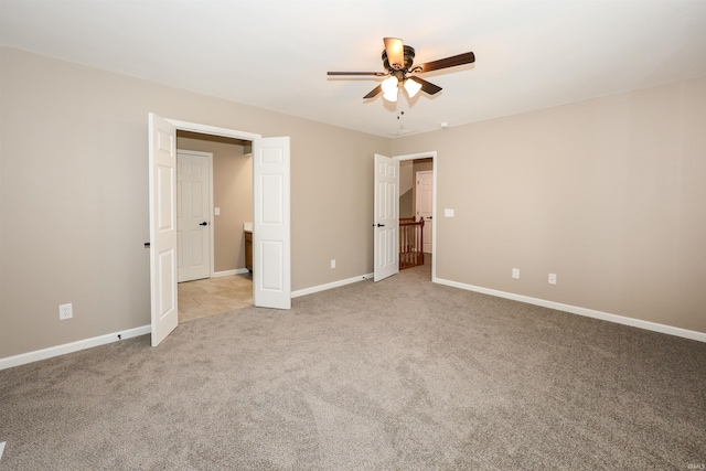 7001 Sweet Gum Ct, Fort Wayne, IN 46804 - unfurnished bedroom with carpet flooring, baseboards, and ceiling fan