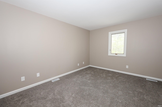 7001 Sweet Gum Ct, Fort Wayne, IN 46804 - empty room with dark carpet and baseboards