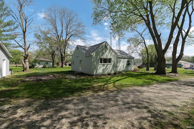 view of home's exterior featuring a yard