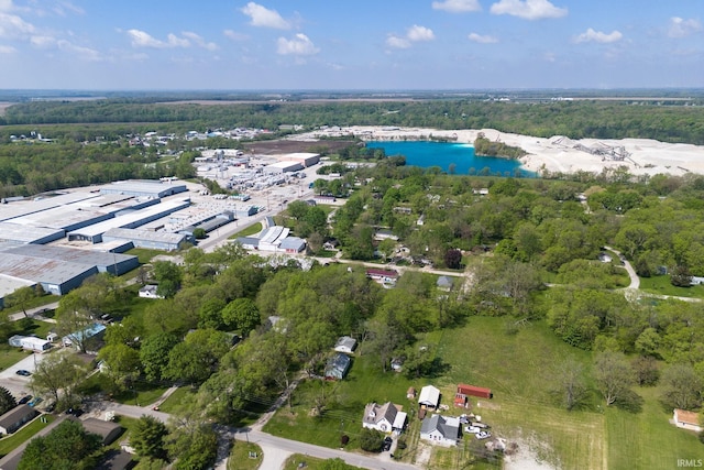 aerial view of property's location featuring a nearby body of water
