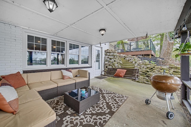 view of patio / terrace featuring an outdoor living space and grilling area