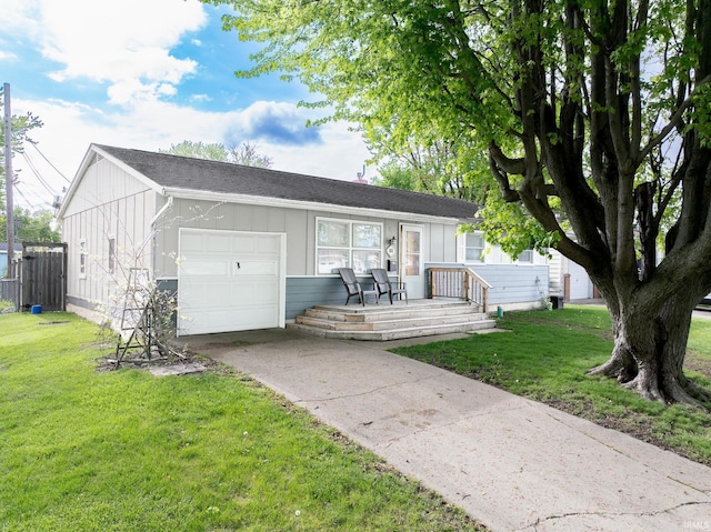 view of front of home with an attached garage, driveway, board and batten siding, and covered porch