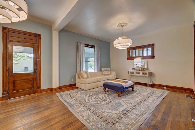 489 S Lincoln St, Orleans, IN 47452 - living area featuring baseboards and dark wood-style flooring
