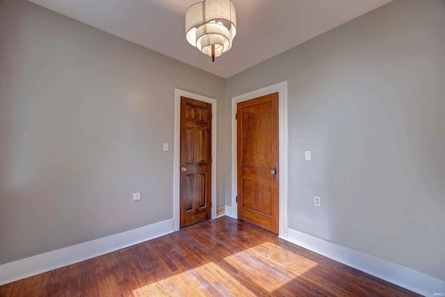 489 S Lincoln St, Orleans, IN 47452 - empty room with baseboards and wood finished floors