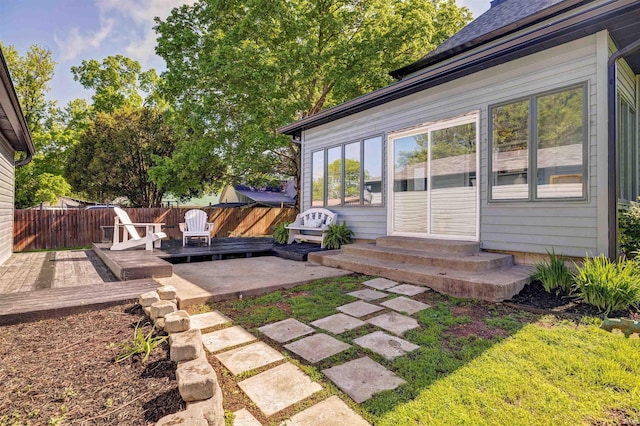 489 S Lincoln St, Orleans, IN 47452 - back of house featuring fence, entry steps, a patio, and a wooden deck
