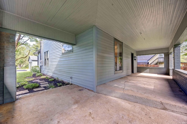 489 S Lincoln St, Orleans, IN 47452 - view of patio / terrace featuring an attached carport