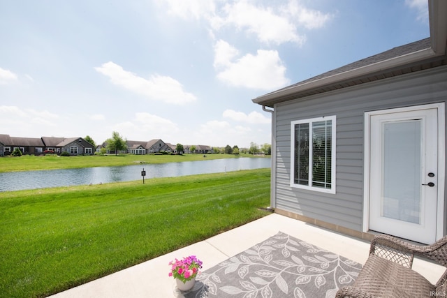 view of patio with a water view
