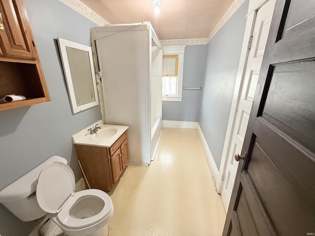 118 13th St, Logansport, IN 46947 - full bathroom featuring a shower, toilet, vanity, and baseboards