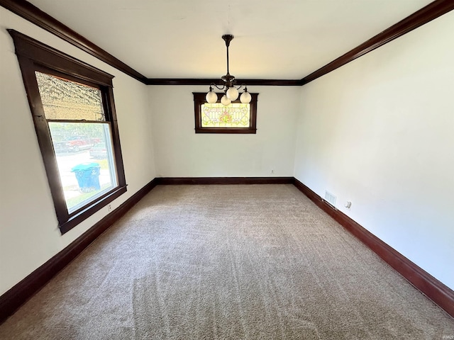 118 13th St, Logansport, IN 46947 - empty room with healthy amount of natural light, carpet, baseboards, and ornamental molding