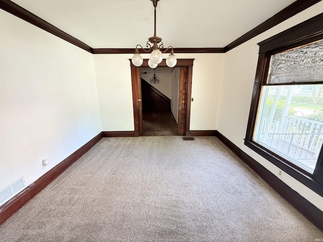 118 13th St, Logansport, IN 46947 - unfurnished dining area with carpet, baseboards, crown molding, and a chandelier