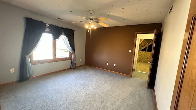 9081 N 725 E, Otterbein, IN 47970 - unfurnished room featuring light carpet, a ceiling fan, and baseboards