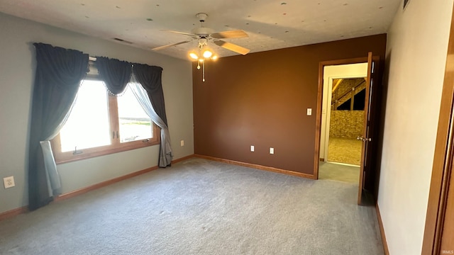 9081 N 725 E, Otterbein, IN 47970 - unfurnished room featuring light carpet, a ceiling fan, and baseboards