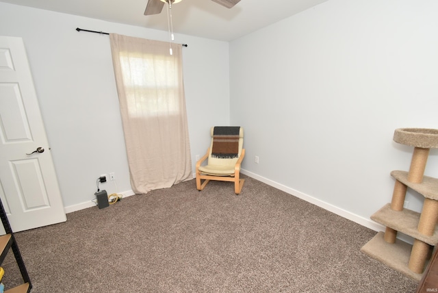 unfurnished room with a ceiling fan, carpet floors, and baseboards