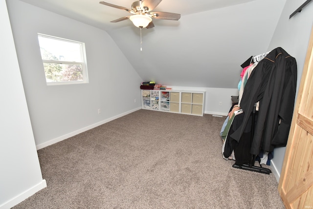 game room with lofted ceiling, carpet, ceiling fan, and baseboards