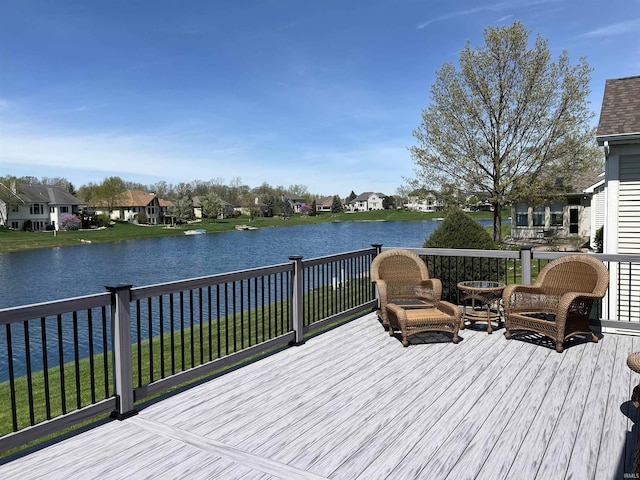 12217 Harvest Bay Dr, Fort Wayne, IN 46845 - wooden deck with a residential view, a water view, and a yard