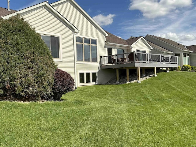 12217 Harvest Bay Dr, Fort Wayne, IN 46845 - rear view of house featuring a wooden deck and a lawn