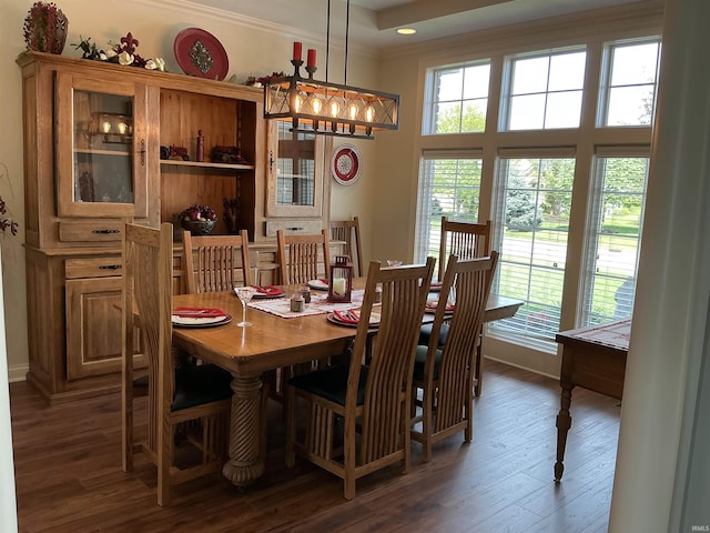 12217 Harvest Bay Dr, Fort Wayne, IN 46845 - dining space with crown molding, wood finished floors, recessed lighting, baseboards, and a chandelier