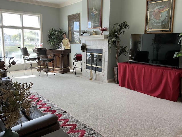 12217 Harvest Bay Dr, Fort Wayne, IN 46845 - living room featuring carpet floors, ornamental molding, a tile fireplace, and baseboards