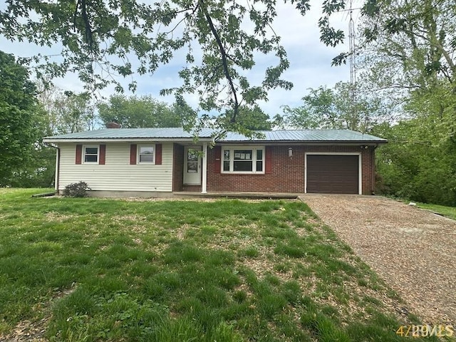 108 S Main St, Patoka, IN 47666 - single story home with a garage, driveway, a front yard, a chimney, and brick siding