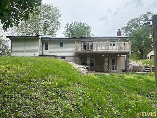 108 S Main St, Patoka, IN 47666 - rear view of house featuring a wooden deck and a chimney