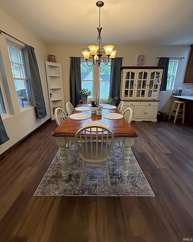 110 W Elnora St, Odon, IN 47562 - dining room featuring a chandelier and dark wood-type flooring