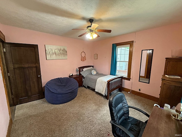 110 W Elnora St, Odon, IN 47562 - bedroom featuring carpet floors, a textured ceiling, ceiling fan, and baseboards