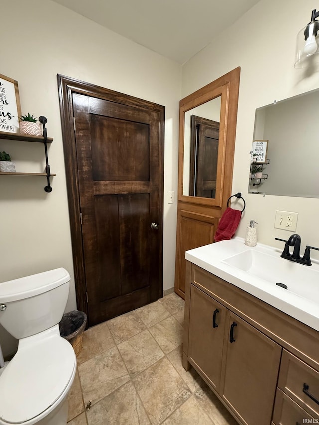 110 W Elnora St, Odon, IN 47562 - bathroom featuring toilet and vanity